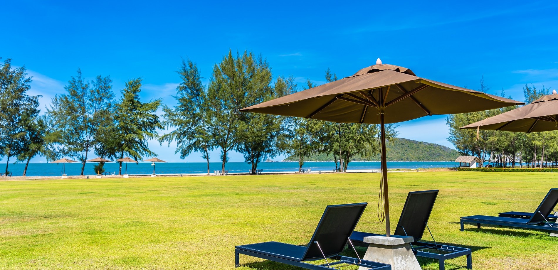 beautiful-outdoor-landscape-sea-beach-with-umbrella-chair_1_.jpg